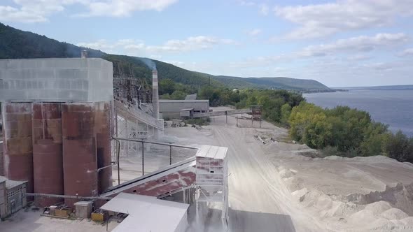 Aerial View on Buildings of Plant of Mining Limestone in Sunny Day