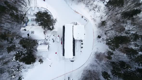 Aerial top view of ski resort and ski lift in winter mountain resort