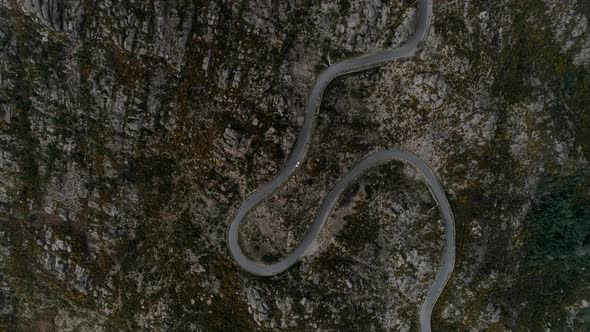 Curve of Serpentine Road in Mountain at Morning alt