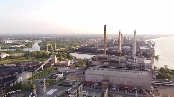 Smokestacks With Blinking Lights At DTE Coal Power Plant In Rouge River, Detroit, Michigan - drone p alt