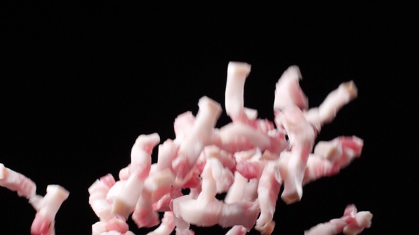 Raw pork chops fly against black background - Preparation for Chinese cuisine cooking alt