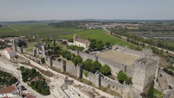 Strategic hilltop setting of Montemor-o-Velho castle, Portugal; aerial