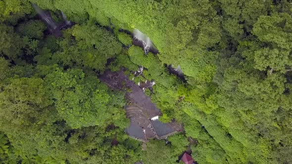 waterfalls in a dense jungle.Gorgeous aerial view flight bird's eye view drone footageWaterfall Be alt