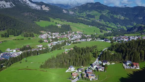 Beautiful Aerial View of Badia Village in Dolomites in Italy alt