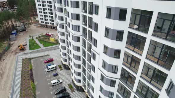 Aerial View of a Newly Modern MultiStorey Building in a Forest Area alt