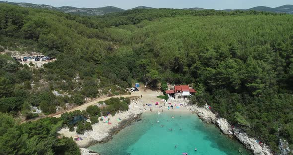 Aerial view of a bay with beach on Korcula island, Croatia. alt