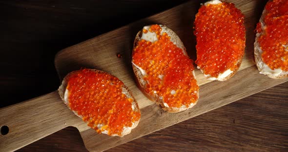 Delicious Sandwiches with Red Caviar Slowly Rotate