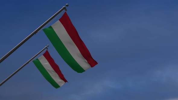 Hungary Flags In The Blue Sky - 4K