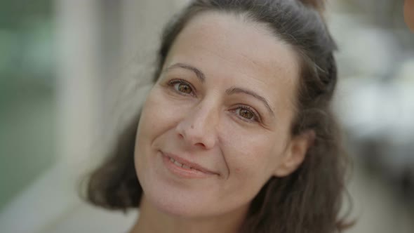 Closeup Shot of Attractive Mature Lady Smiling alt