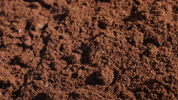 Ground Arabica coffee close-up 4K panning footage alt