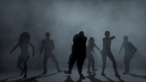 Group of scary attacking zombies . Halloween concept.
