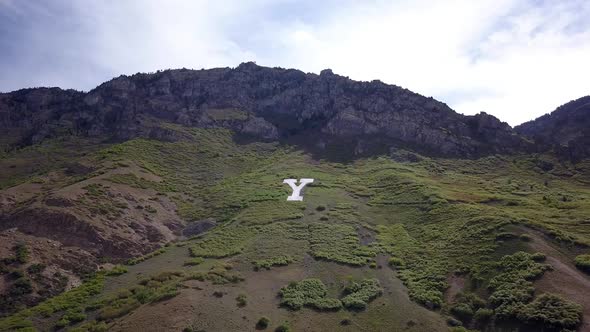 Flying up the front of Y Mountain moving closer to the hillside alt