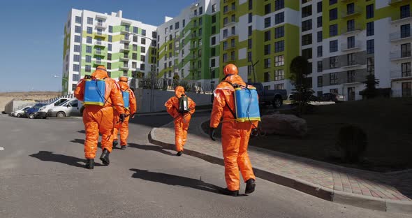 Coronavirus Pandemic - Cleaning And Disinfection. Professional Teams For Disinfection Work. alt