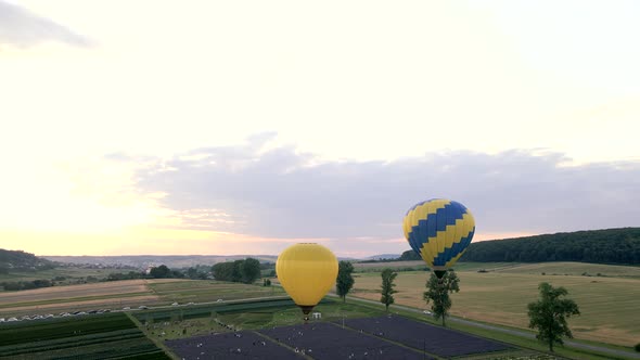 Air Balloons with Basket in Sky