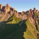 Dolomites mountains peaks with a hiking path on a summer sunrise - VideoHive Item for Sale