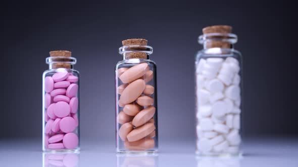 Colorful Pills in Bottles alt