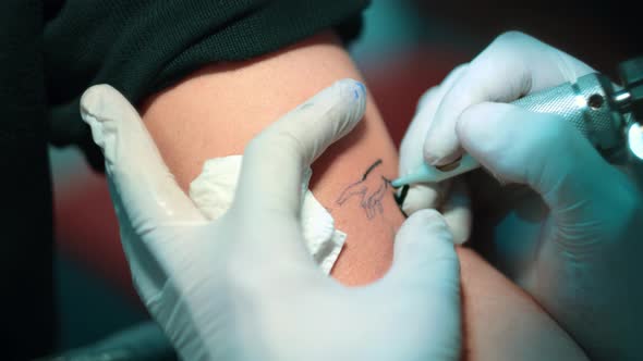 Tattoo Filling Session with Black Color alt