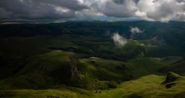 Low Clouds over a Highland Plateau in the Rays Of Sunset alt