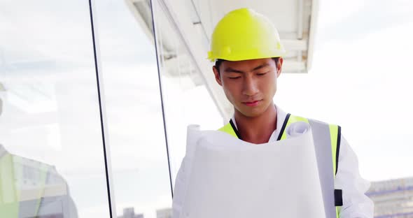 Architect reading plan alt