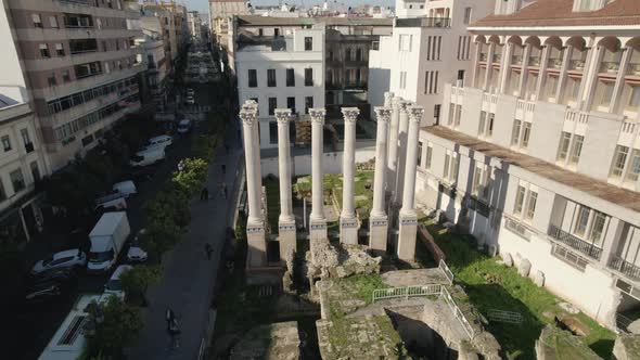 Roman temple of Córdoba, Downtown, Aerial Orbiting Temple remains Columns. Spain
