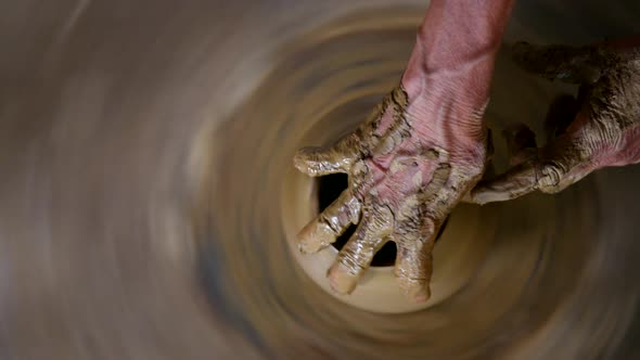 Upper View Female Potter Makes Clay Pot Neck By Hands alt