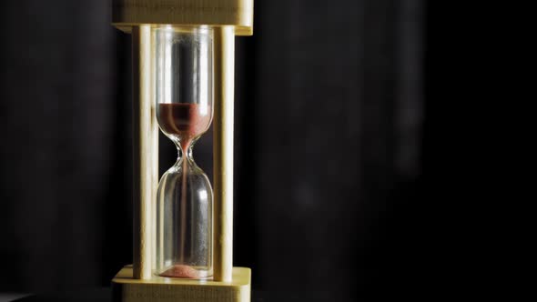 Hourglass Closeup on Dark Background alt