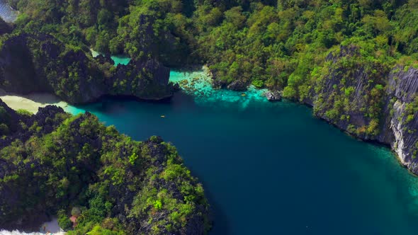 Rocky Mountains with Big Paradise Lagoons in El Nido, Palawan, Philippines. Aerial View  alt
