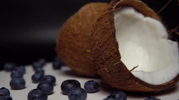 The Handful of Blueberry and Halves of Coconut