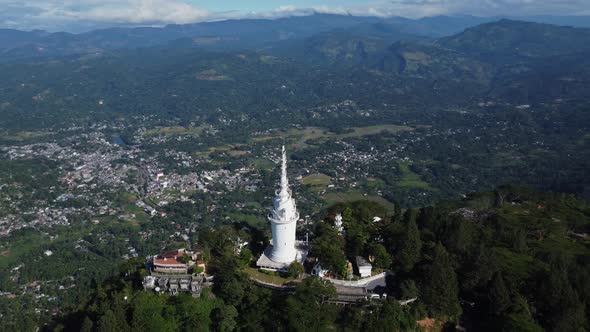 Ambuluwawa Biodiversity Complex. Sri Lanka. Temple on top of a mountain with a spiral staircase. alt
