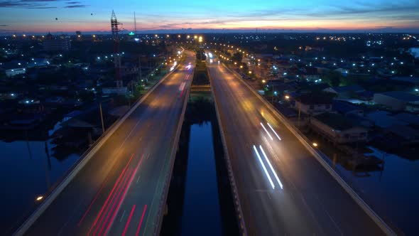 4K Hyper lapse : Fly over a bridge and a river. Cinematic drone shot. thailand alt
