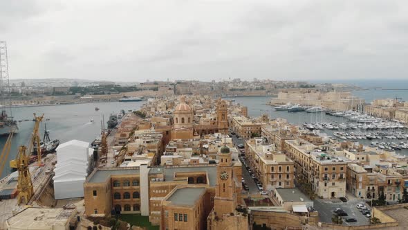 Aerial Push In Shot Over Senglea City In Malta alt