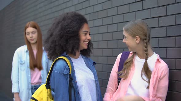 Female Friends Laughing at New Classmate, College Rejection, Lack Communication alt