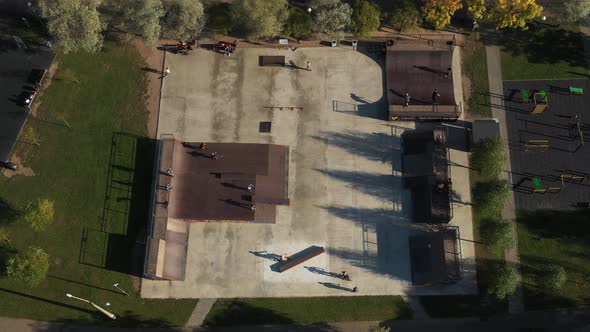 Children Ride on the Outdoor Skateboard Court alt