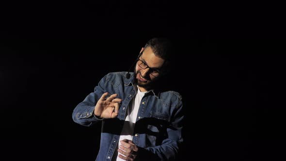 Male Motivational Speaker Business Coach on Stage Talking About Happiness Diversity Success alt