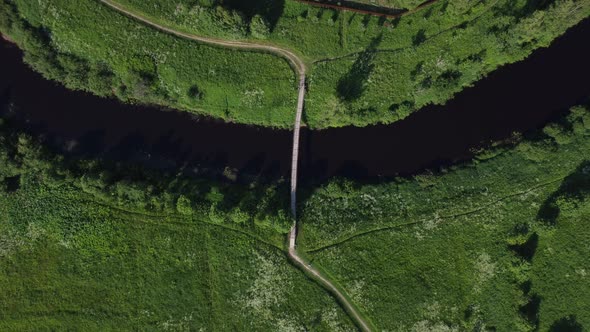 Evening Flight Over the River Among the Fields
