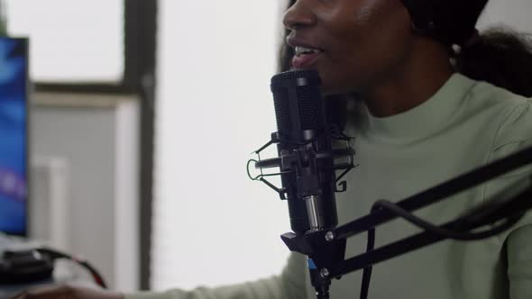 Close Up of Black Streamer Cyber Performing Space Shooter Video Game alt