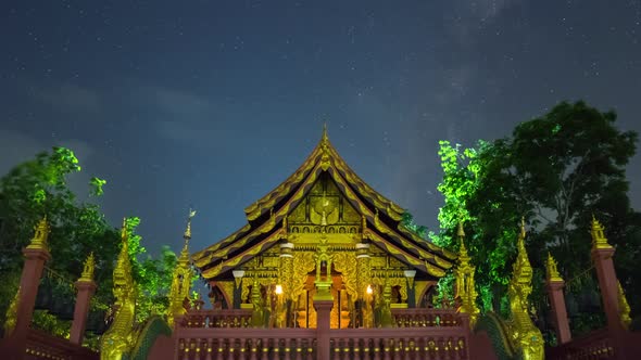 Milky way and clouds moving at night view point. alt