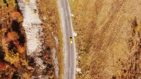 Drone Flight Over Fall Village. Autumn Leaves and Trees. Orange, Red, Yellow and Green