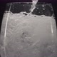 Foaming Water Pouring Ice Wineglass Closeup - VideoHive Item for Sale