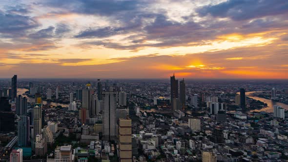 day to night time lapse of Bangkok city with Chao Phraya River, Thailand alt
