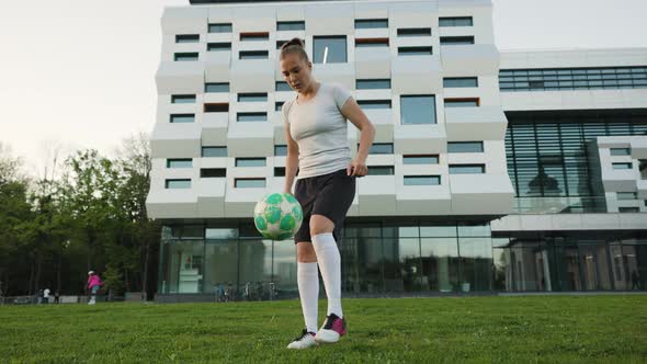Portrait of Woman Football Soccer Player in Full Growth in the Park