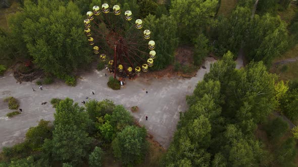 Aerial view of old abandoned Ferris wheel in the ghost town Pripyat alt