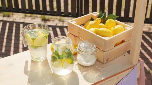 Outdoor Wooden Stand With Freshly Made Lemonade alt