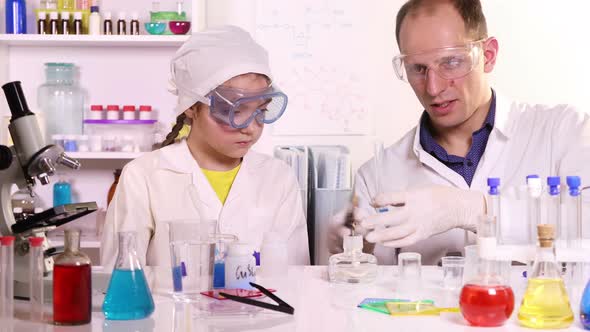 A Young Teacher Conducts a Chemistry Lesson