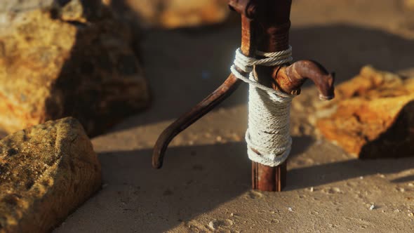 Old Abandoned Hand Water Pump in Desert alt