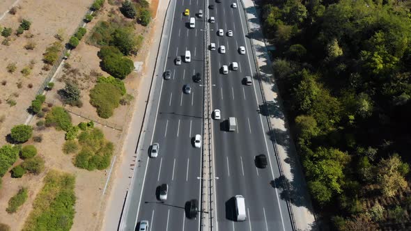Aerial drone view of busy highway road alt