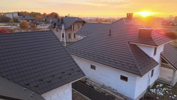 Aerial View of Unfinished House with Aerated Lightweight Concrete Walls and Wooden Roof Frame alt