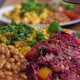 Close Up of Seasoning with Grinder Vegan Breakfast of Tofu Omelet, Beans and Salad  - VideoHive Item for Sale