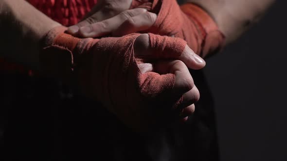 Muay Thai Professional Boxer Adjusting Bandages on His Hands Before Fight, Sport alt