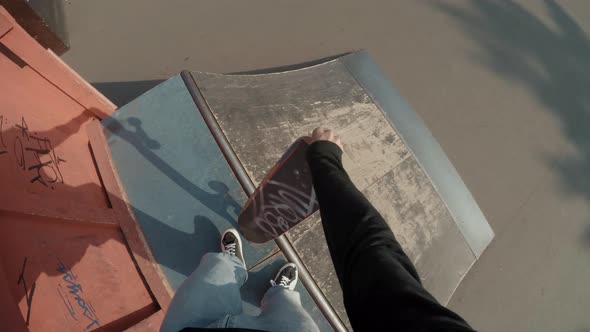 POV of Guy Skating in Skatepark alt